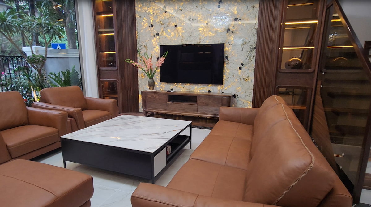 Nội thất phòng khách biệt thự before after thể hiện sự thay đổi ấn tượng từ không gian xây thô thành khu vực tiếp khách sang trọng, hiện đại và đẳng cấp.